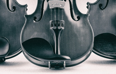 The abstract art design background of half front side violin put on background,show detail and part...