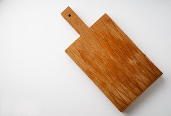 Cutting boards made of wood on white background with copy space
