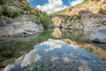 Fototapeta na wymiar Old Genovese bridge near Asco (Corsica) - long time exposure