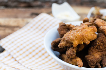 Breaded chicken breast with barbecue sauce and mayonnaise