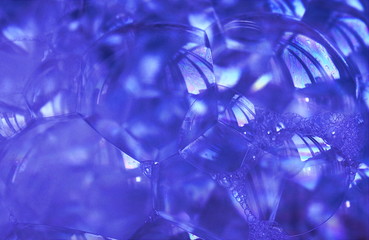 Transparent soap bubbles of a blue shade