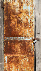 Rusty Painted Hinged Door. Corrosion Of The Metal Plate. Texture, Background Series.