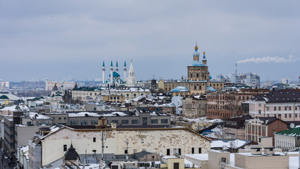 Fototapeta premium view from the Bell-Tower of the Epiphany at the ensemble of the Kazan Kremlin in winter