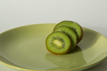 Sliced kiwi on a plate