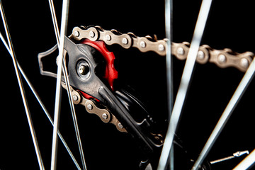 Bicycle parts isolated on black