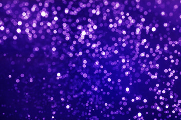 abstract blue bokeh bright glitter sparkle glowing background. for template web advertising design brand, backdrop, party, new year christmas celebration etc.