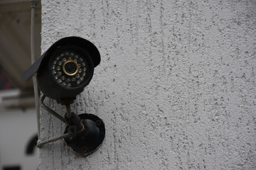 white surveillance camera  and landscape