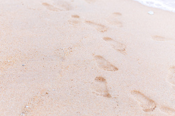 foots stamp on beach