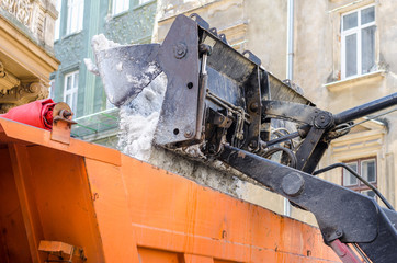 Truck snow cleaner removes snow utility service tractor parts fuel oil soot rust old bolts nuts piston background ancient city