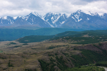 Kurai steppe and North-Chui ridge of Altai mountains, Russia. Cloud day.