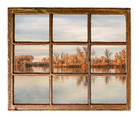 calm lake at sunset -window view