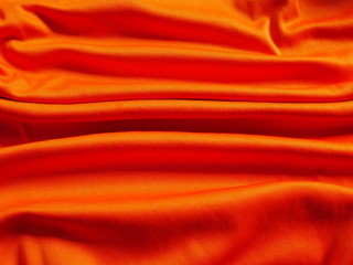 orange sportswear clothing background,silk fabric cloth