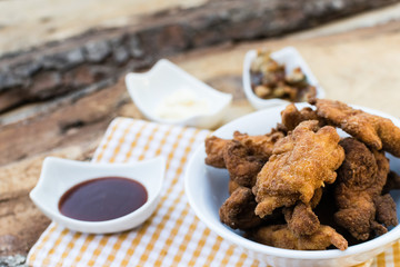 Breaded chicken breast with barbecue sauce and mayonnaise
