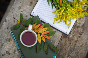 Cup of tea, book, flowers, autumn