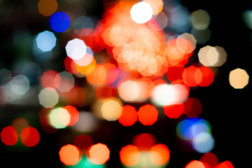 Abstract colorful lights blur and bokeh of Christmas Tree yellow, red, blue, green, gold Chrismas, New Year Vintage style.