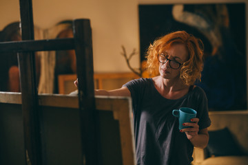 Woman working in her art studio