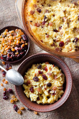 Sweet millet porridge with raisins and dried cranberries