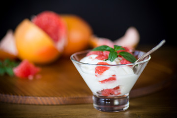 sweet homemade organic yogurt with slices of red grapefruit