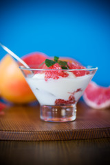 sweet homemade organic yogurt with slices of red grapefruit