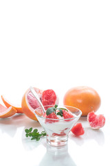 sweet homemade organic yogurt with slices of red grapefruit