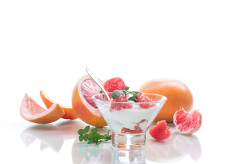 sweet homemade organic yogurt with slices of red grapefruit