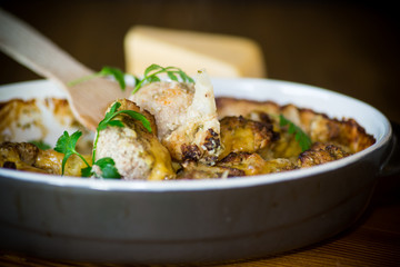 Cauliflower baked with meatballs in cheese sauce