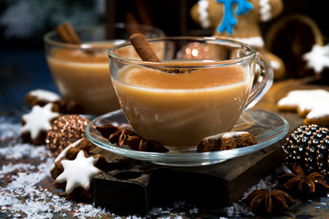 winter treats, masala tea and gingerbread man cookies, closeup