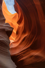 blue sky with orange sandstone cliff of lower antelope .. slot canyon in Arizona , USA.