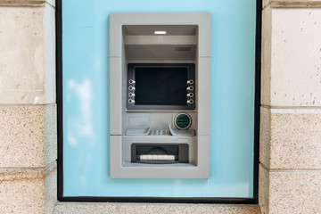 Modern street ATM machine for withdrawal of money and other financial transactions.