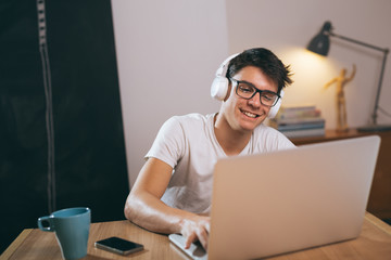teenager taking online lessons on laptop