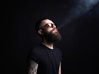 Brutal bearded man in sunglasses