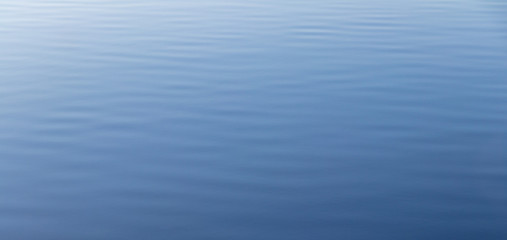 background. blue ripples on the river \ sea