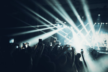 MINSK, BELARUS - 20 SEPTEMBER, 2018: Crowd at concert - retro style photo