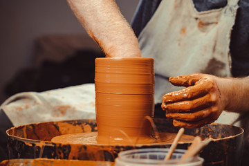 Potter makes a jug