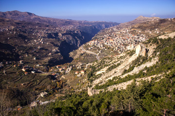 Fototapeta na wymiar A view of Bcharre, a town in Lebanon high in the mountains on the edge of the Qadisha Gorge. Lebanon.