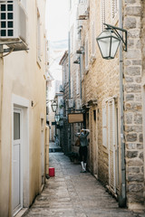 Beautiful view of the traditional narrow old street in Montenegro.