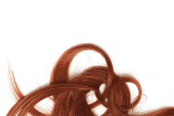 A strands of long, twisted, henna hair isolated on white background
