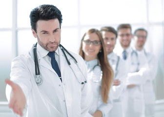 Fototapeta premium doctor is holding out his hand for a greeting