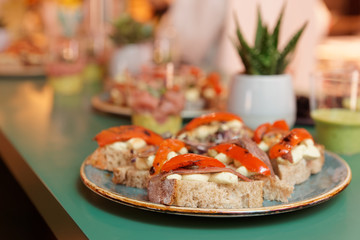 Tapas with anchovies and guacamole
