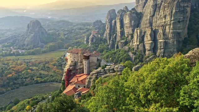 Eastern Orthodox monasteries complex, rocks and a valley in Meteora, Greece. 4K, UHD