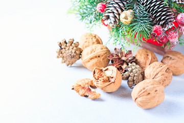 Obraz na płótnie Canvas Christmas composition. Pine tree branches, pine cones, fir cones, nuts.