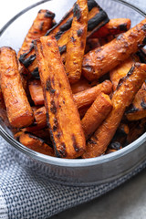 Close up on a bowl of roasted carrots