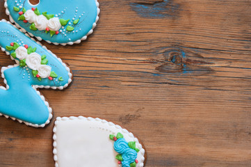 Gingerbread cookies, christmas decoration on wooden background