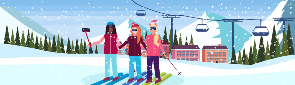 mix race women taking selfie ski resort hotel houses buildings cable car snowy mountains fir tree landscape background winter vacation concept flat horizontal