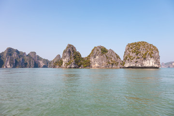 Ha Long Bay in North Vietnam. The bay features thousands of limestone karts and isles in various shapes and sizes.