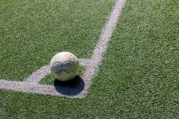 Football on artificial turf. It is for green background in a stadium