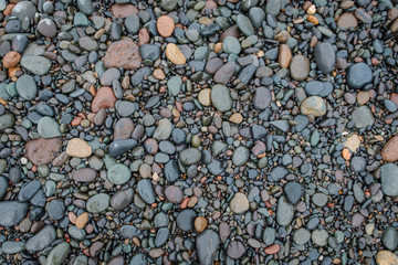 pebble stone beach - stones at ocean coast -