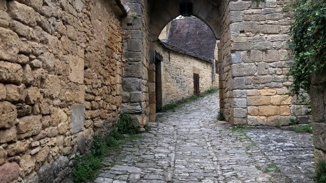 Old cobble streets in the medieval village of Beynac, Dordogne, France