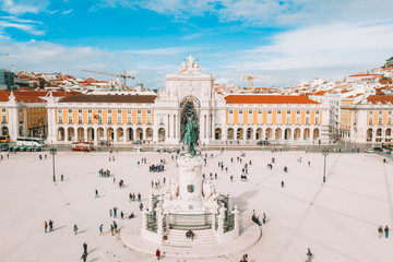 Commerce square, Rua Augusta Arch close-up of the statues by Celestin Anatole Calmels: Glory...