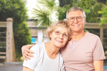 Portrait of happy senior couple smiling